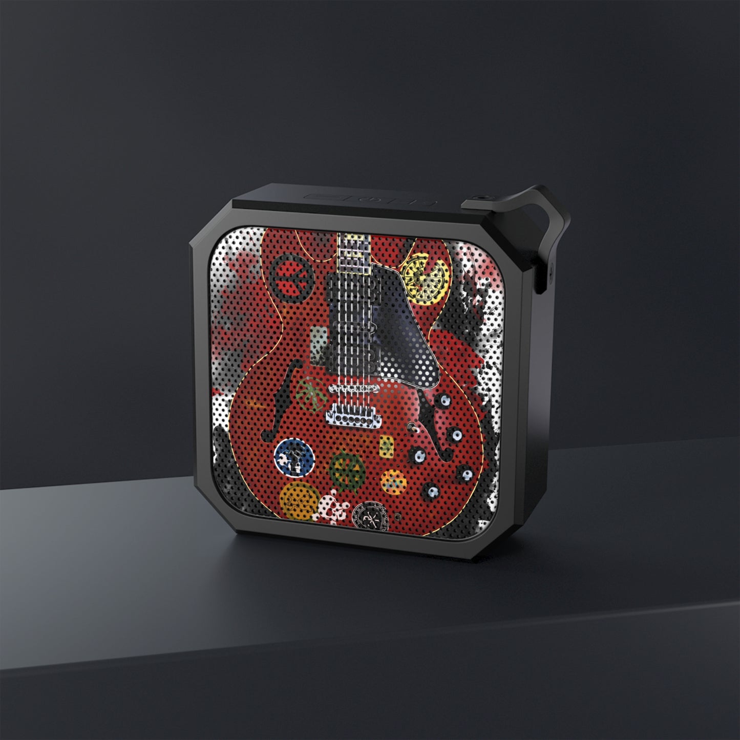 digital painting of a vintage red electric guitar with stickers printed on a bluetooth speaker