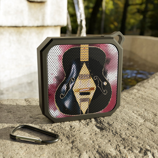 digital painting of a cream black electric guitar printed on a bluetooth speaker