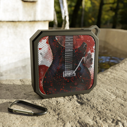 digital painting of a bloody electric guitar printed on a bluetooth speaker