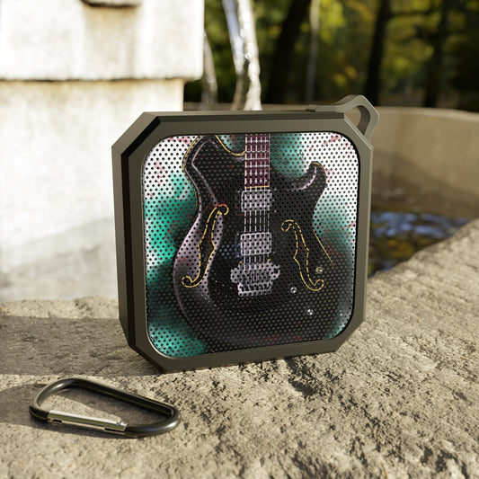 digital painting of a black electric guitar printed on a waterproof bluetooth speaker