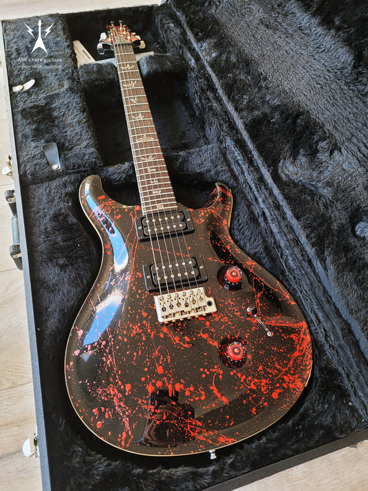 bloody electric guitar in a guitar case