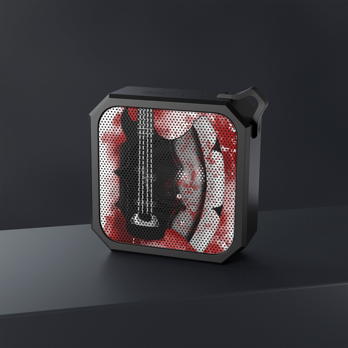 Digital painting of an axe bass guitar printed on a bluetooth speaker