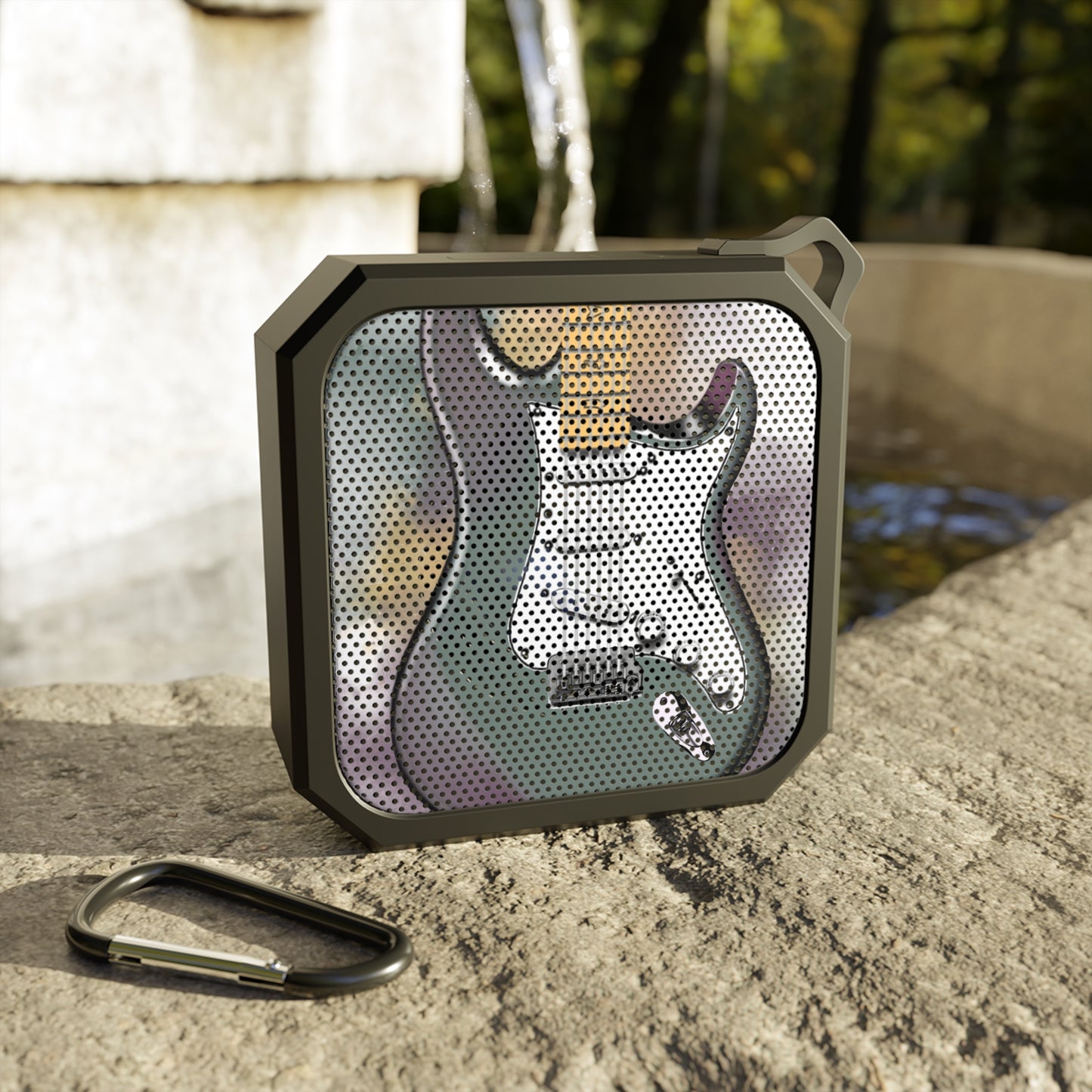 digital painting of a purple green blue electric guitar printed on a bluetooth speaker