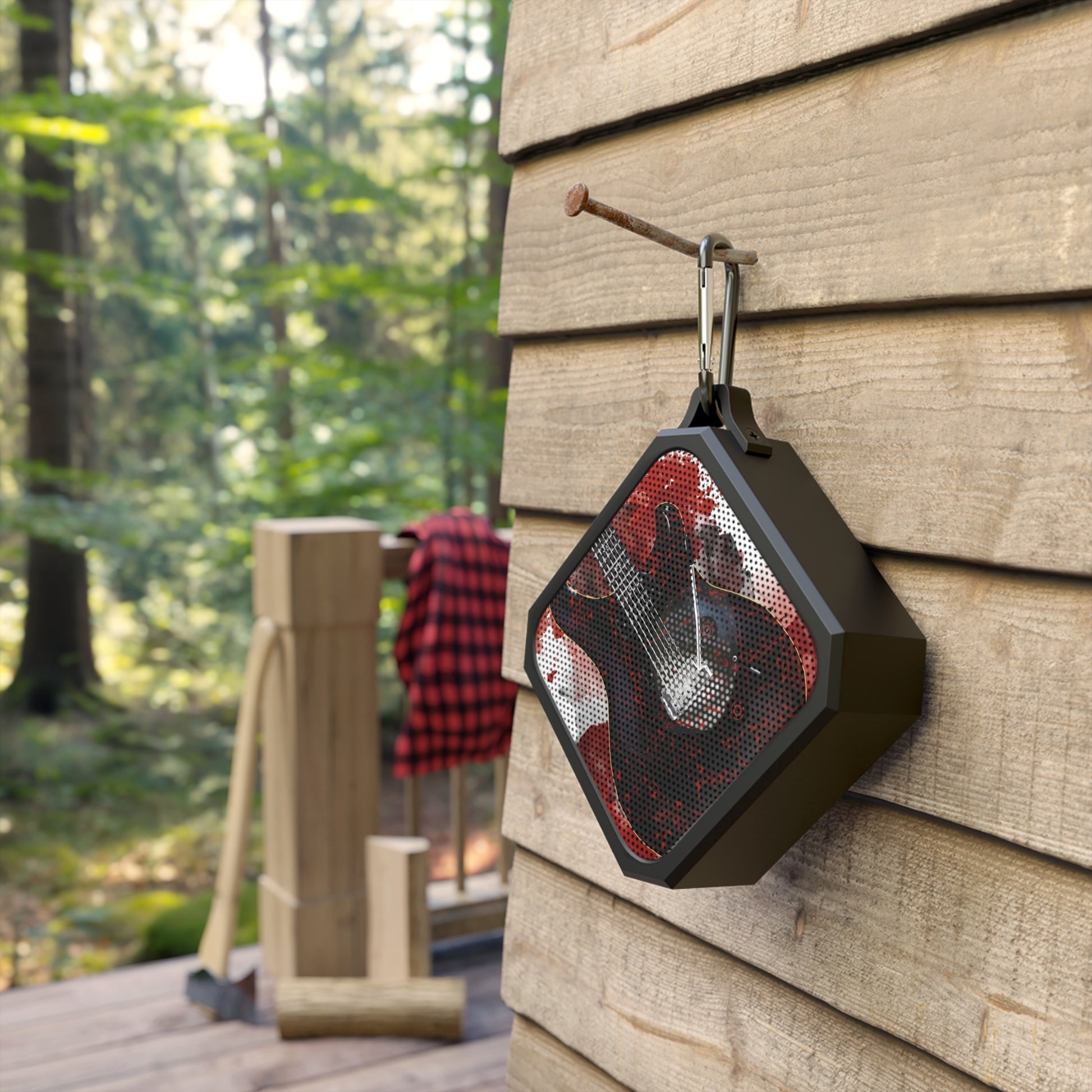 digital painting of a bloody electric guitar printed on a bluetooth speaker