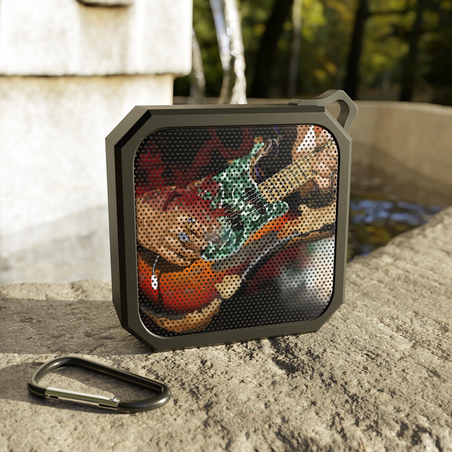 digital painting of a green-vintage sunburst electric guitar with hands printed on a bluetooth speaker