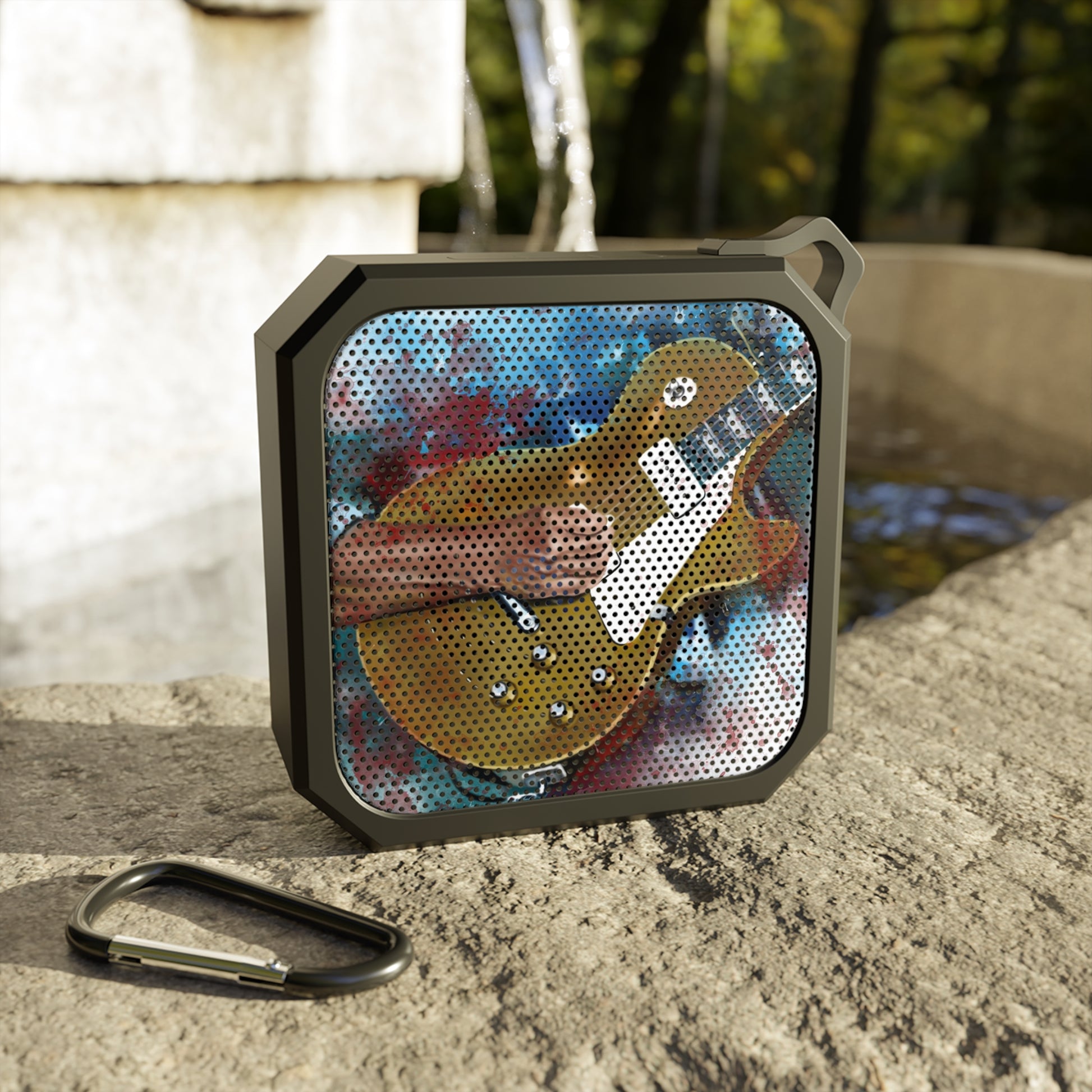 digital painting of a vintage goldtop electric guitar with hands printed on a bluetooth speaker